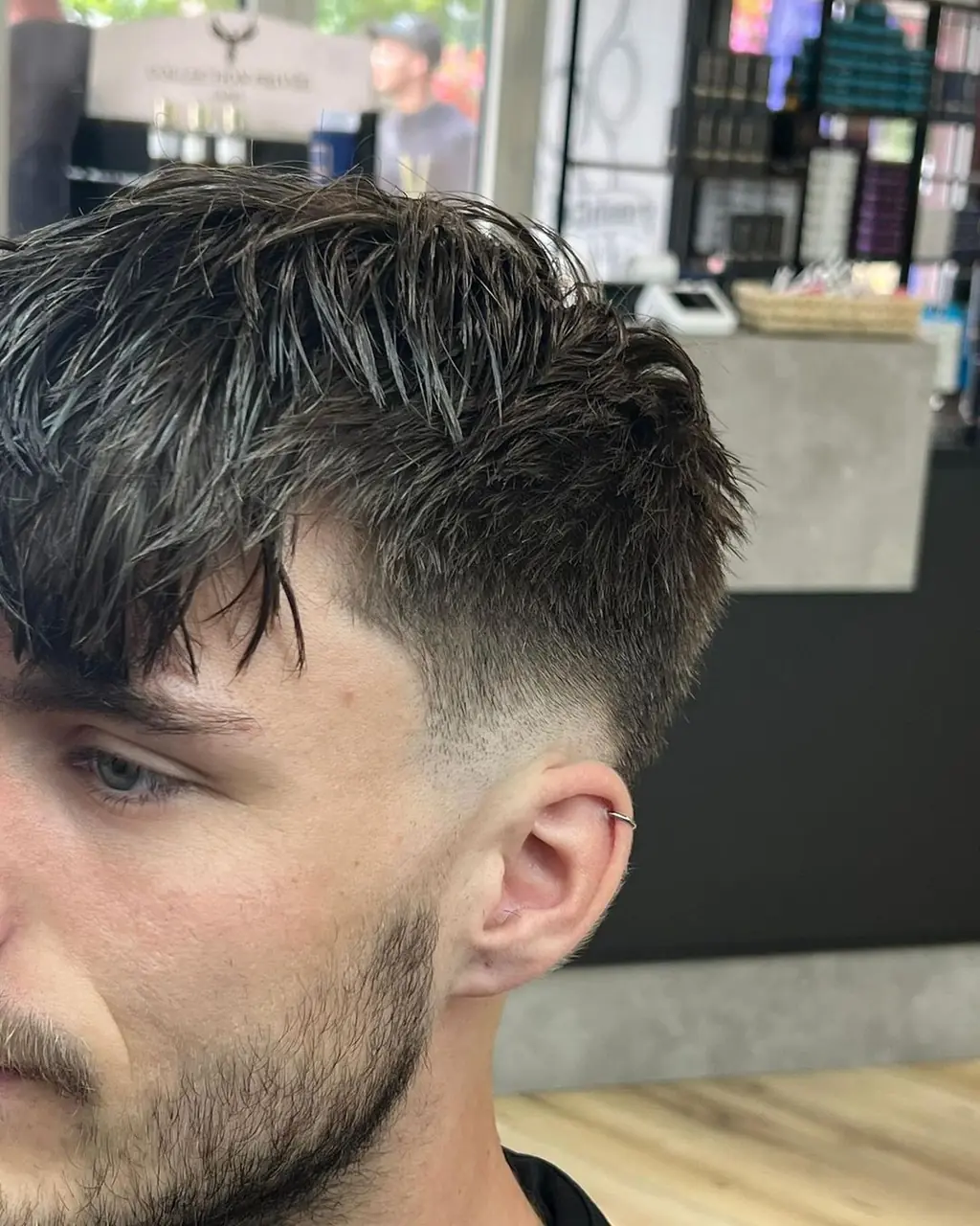 Strakke fade bij FreshCut Studio